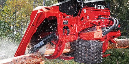 Waratah H216 harvester head cutting wood